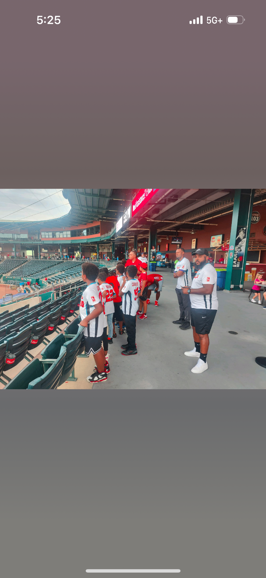 Rockets team touring a baseball stadium